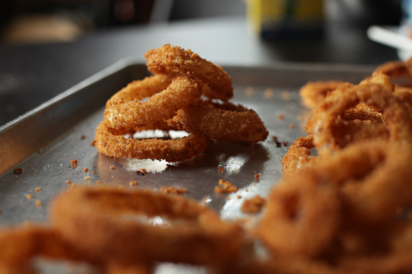 close up of fried onion rings