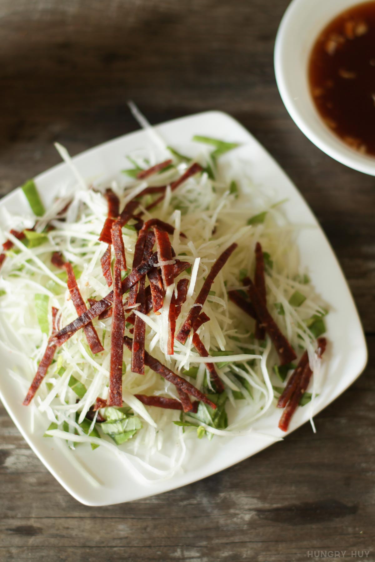 Vietnamese papaya and beef jerky salad close up