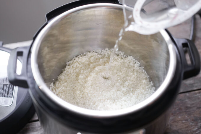 pouring water into the Instant Pot