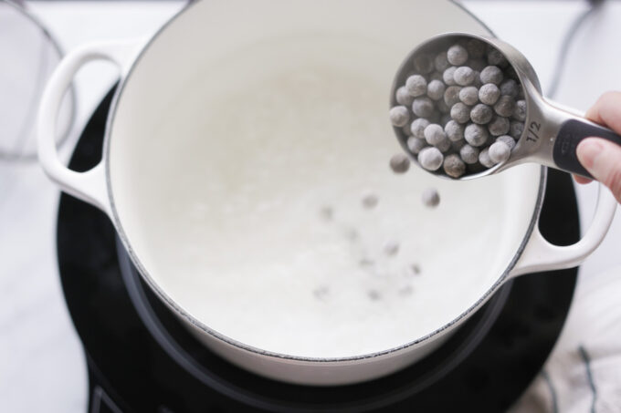 adding boba to boiling water