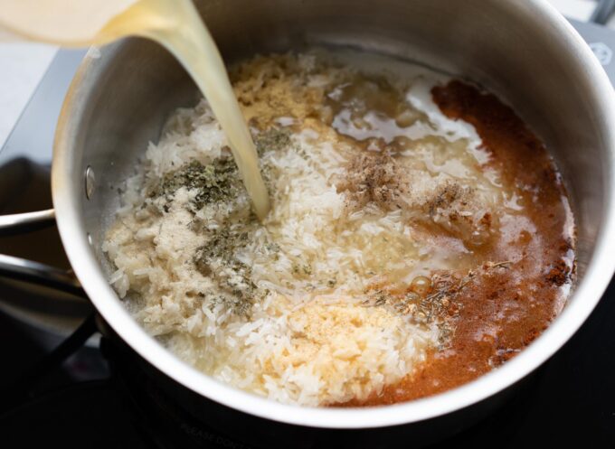 adding all ingredients into the pot