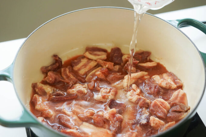 adding water to tocino pot