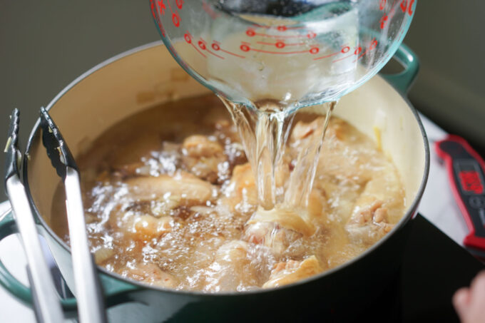 pouring water into the pot