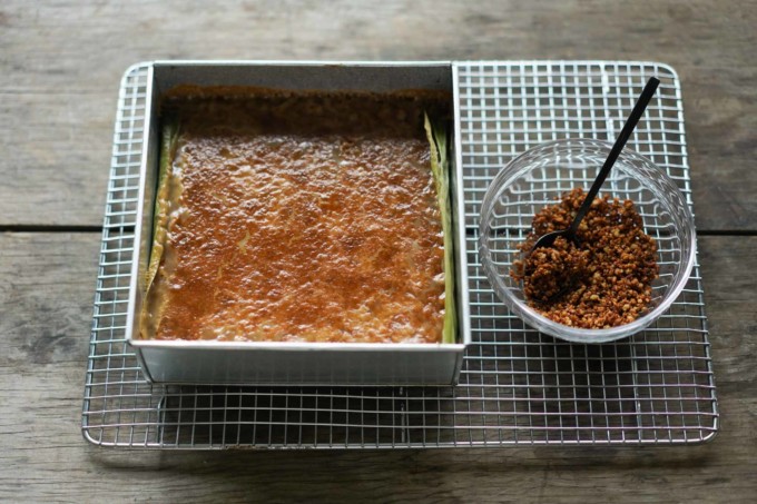 pan of biko out of the oven with a caramelized top