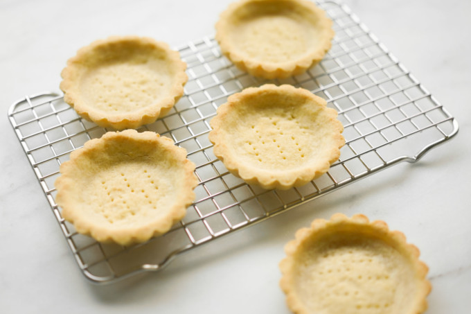 baked tarts on a cooling rack