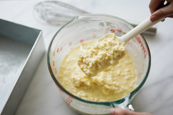 showing liquidy batter consistency with a spatula