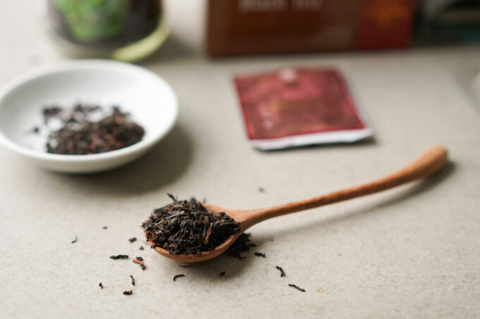 black tea leaves on a spoon