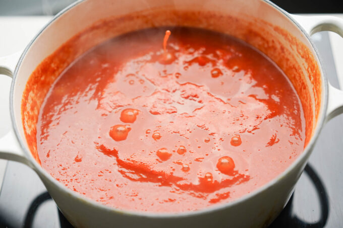 simmering pot of butter chicken