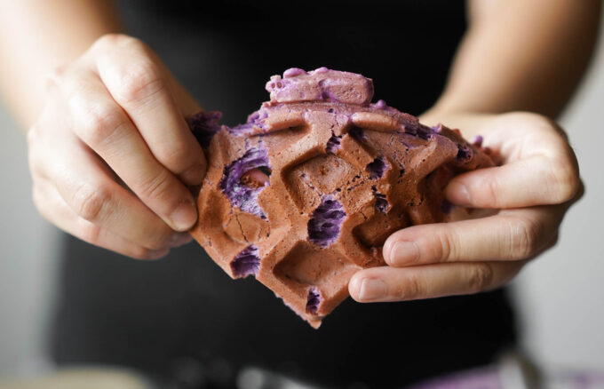 breaking up an ube waffle