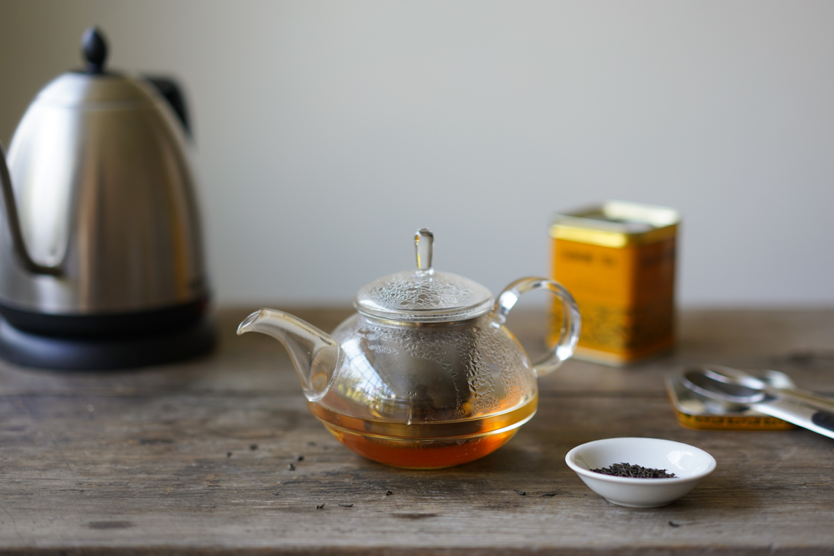 glass tea kettle brewing jasmine tea