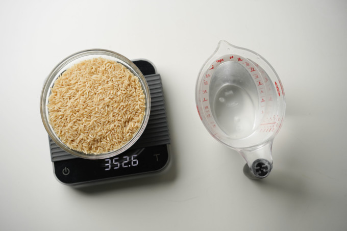 weighing brown rice and water