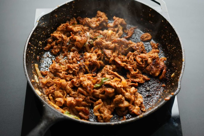 cooked pork bulgogi in cast iron