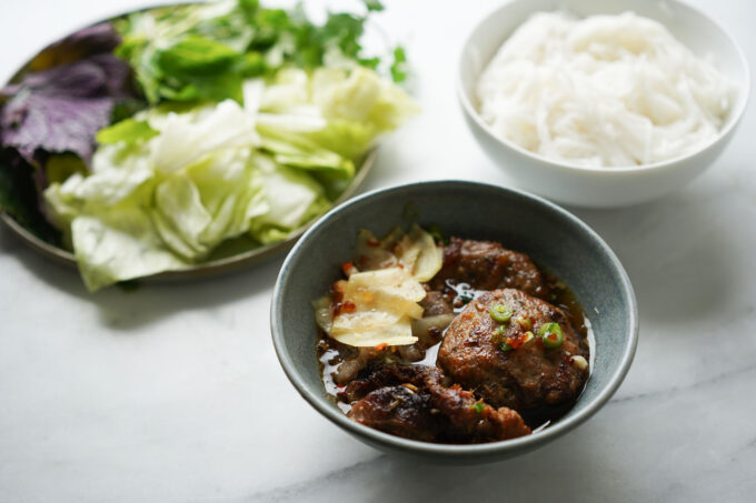 bún chả - grilled pork patties with noodles and veggies