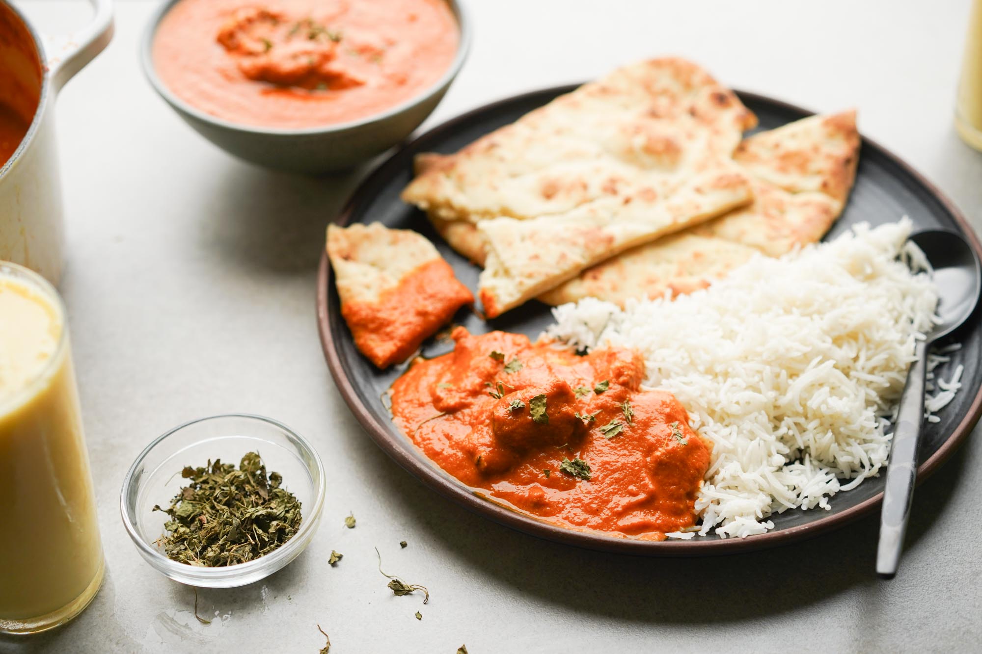 plate of butter chicken and rice