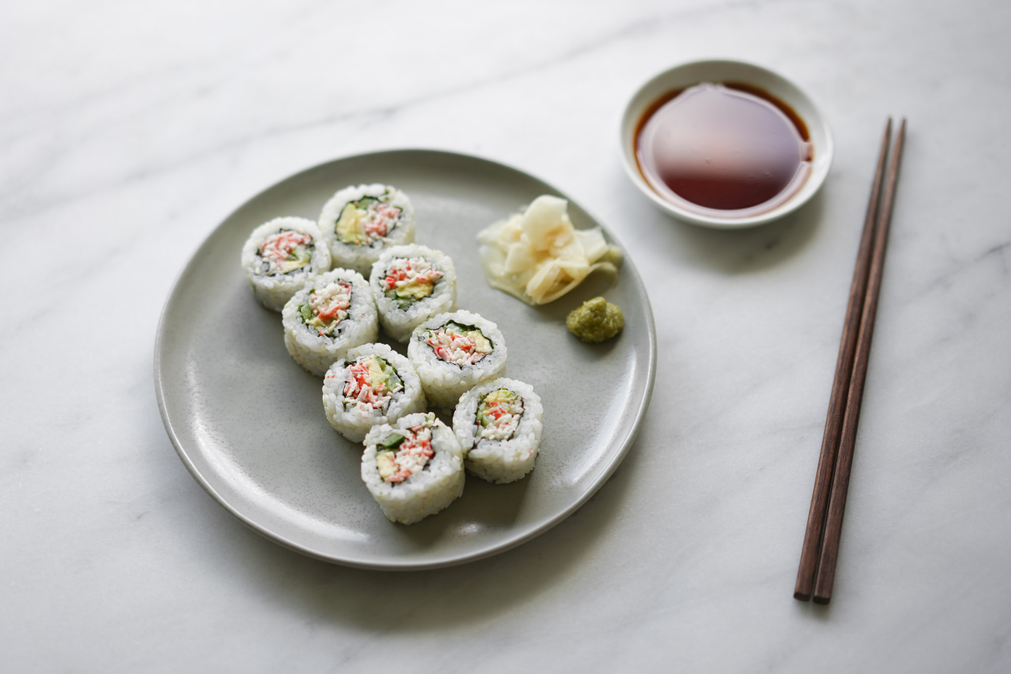 How roll sushi with bamboo mat (California Roll) 