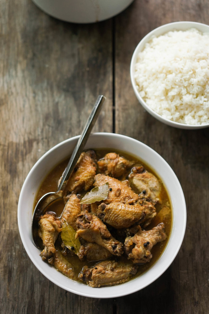 plate of chicken adobo with rice