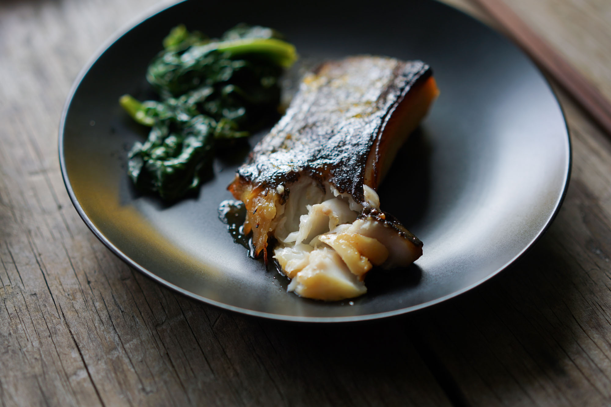 closeup of flaked miso black cod