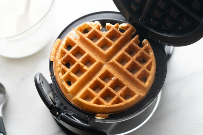 cooked sourdough discard waffle in iron