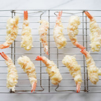 shrimp tempura cooling on a rack