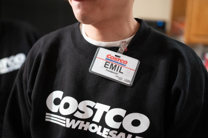 Costco sweatshirt and nametag