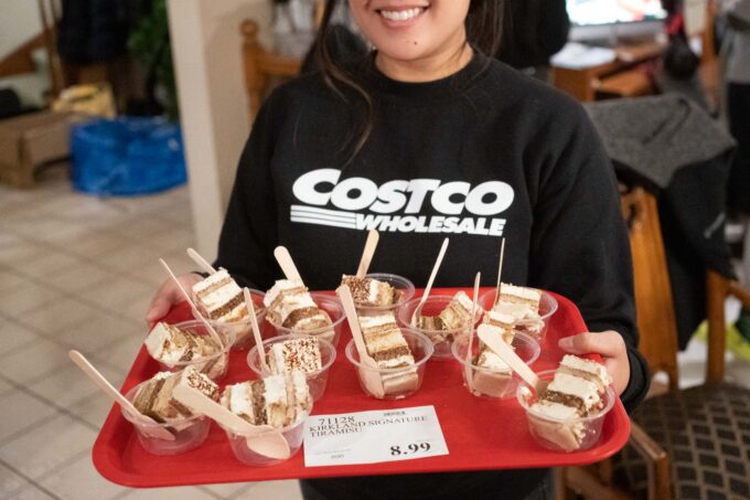 Costco sweatshirt, and tray of tiramisu