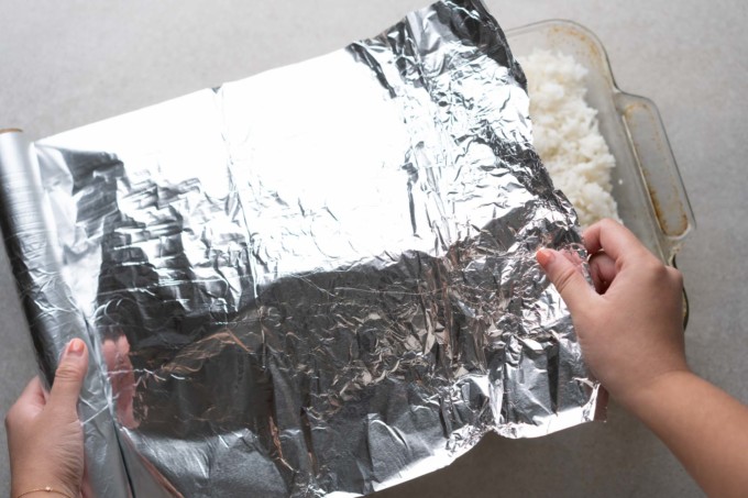 covering baking dish with aluminum foil