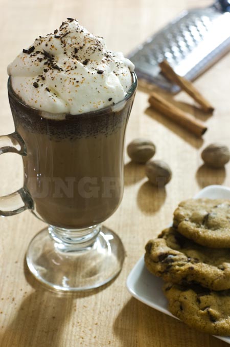 cup of hot cocoa with nutmeg and cinnamon