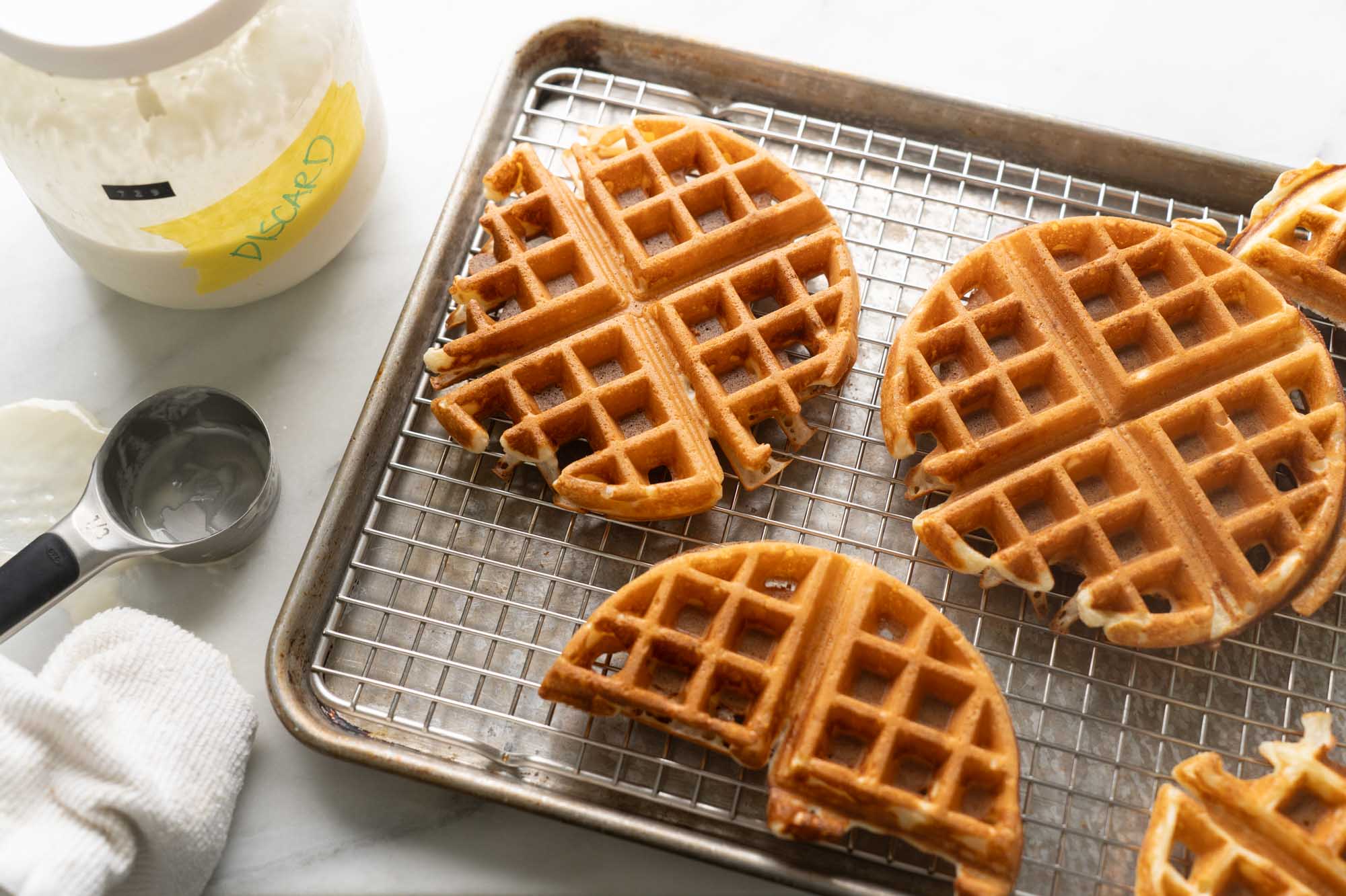 sourdough discard waffles on cooling rack