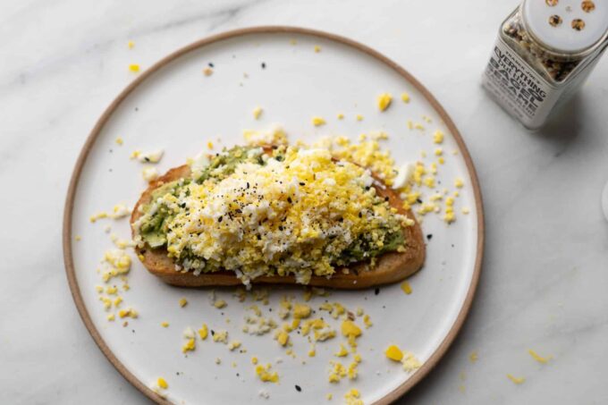 grated egg avo toast with everything seasoning