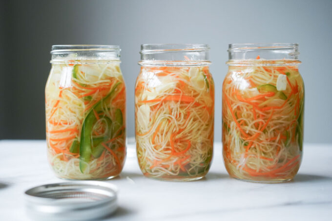 three glass jars of atchara