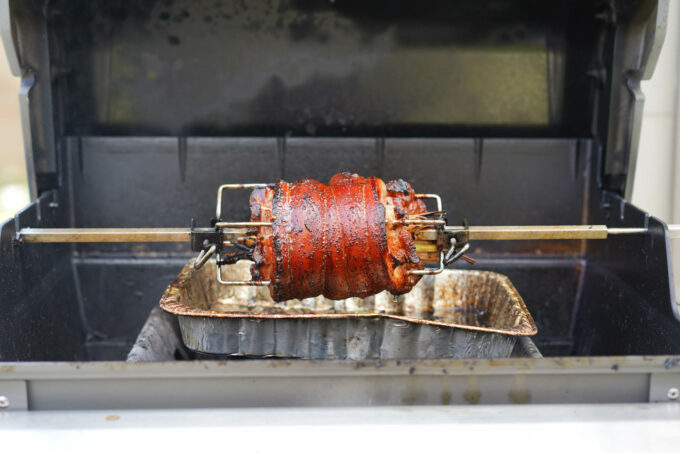 Cebu style belly lechon roasted on a rotisserie