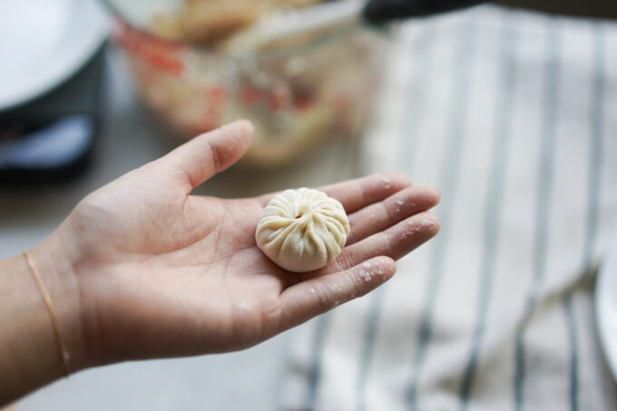 a finished, wrapped xiao long bao