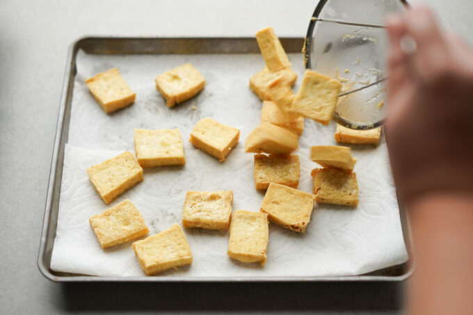 fried tofu on paper towel