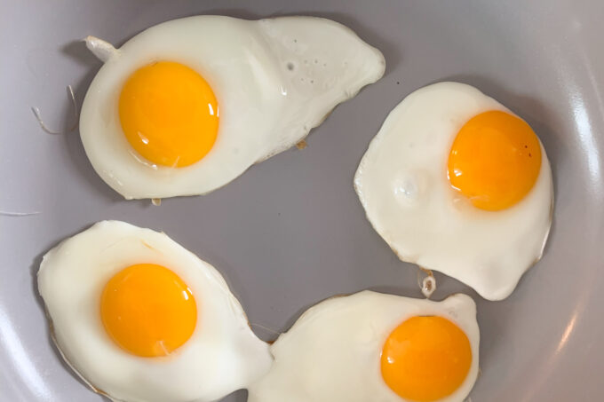 frying four eggs in Caraway saute pan