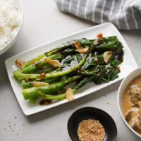 gai lan with fried garlic slices