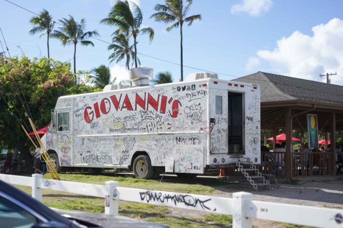 white Giovanni's truck parked for service