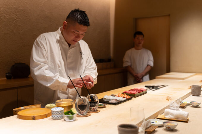 chef Hatano preparing a sushi course