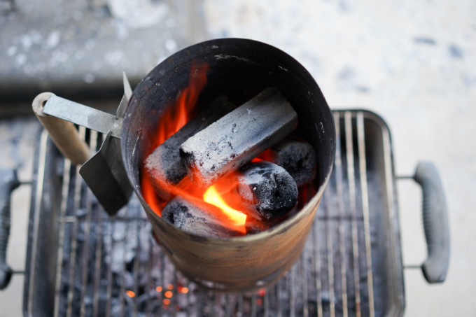 heating binchotan coals in a chimney starter