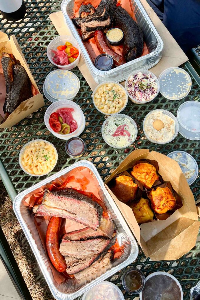 Heritage BBQ: brisket, sausage, beef rib, corn muffins, and sides