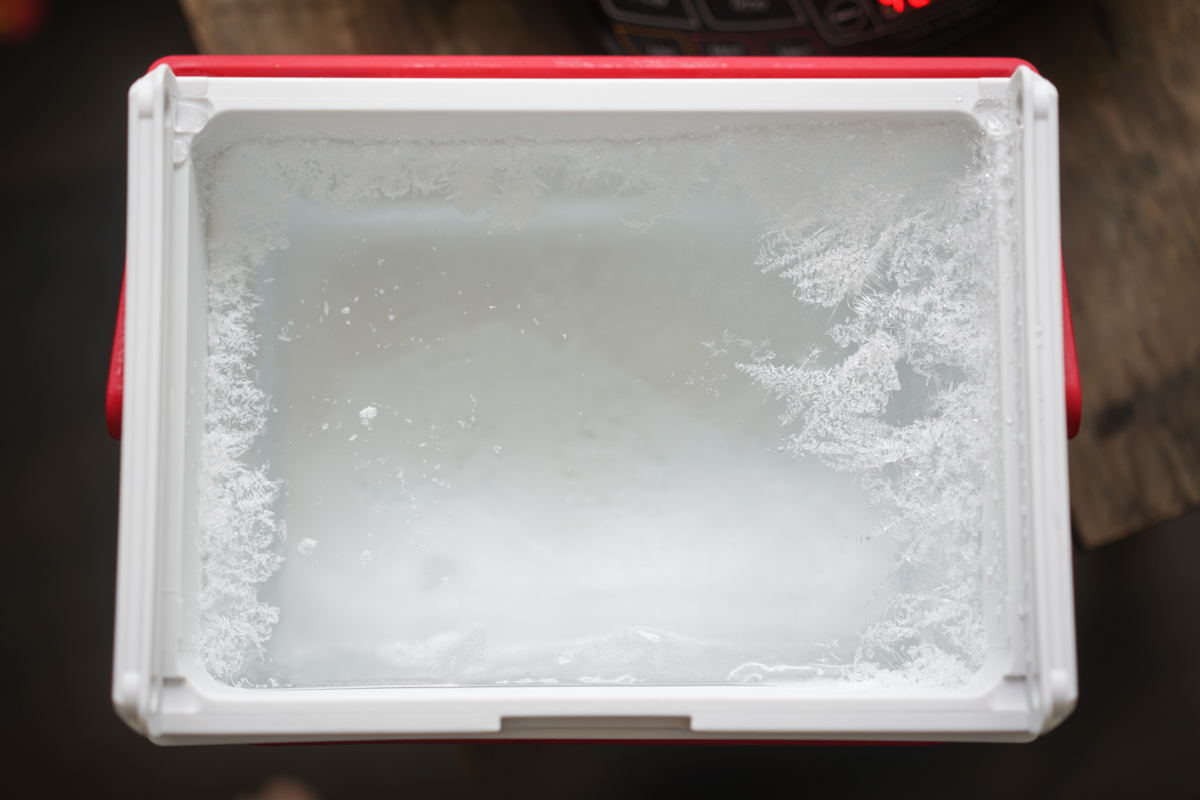 ice frozen in a small cooler