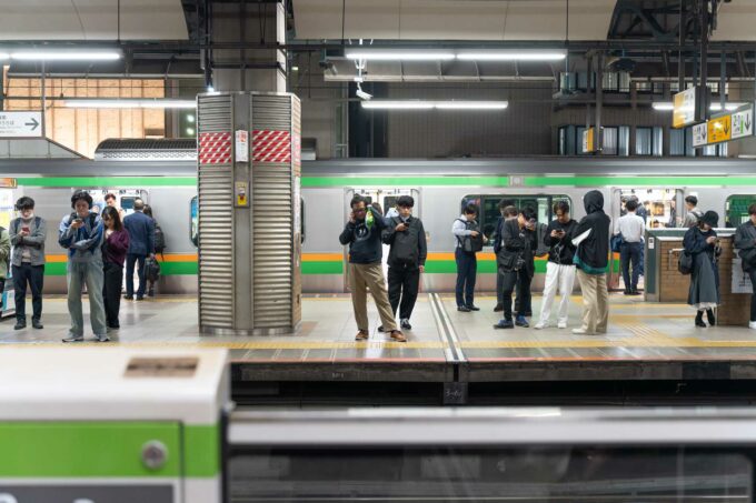 Japanese travelers waiting for the subway