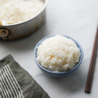 jasmine rice bowl with chopsticks