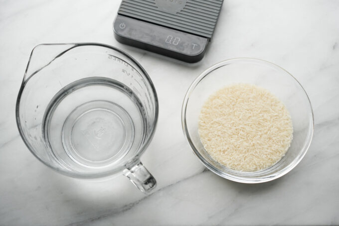 weighed water and rice in glass bowls