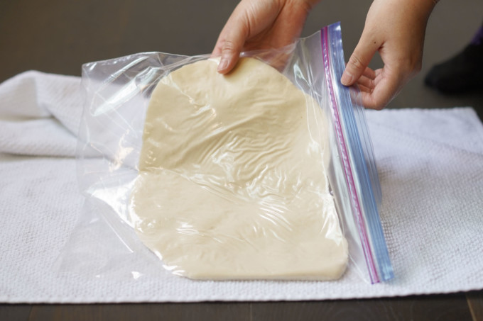 kneaded dough in a plastic bag