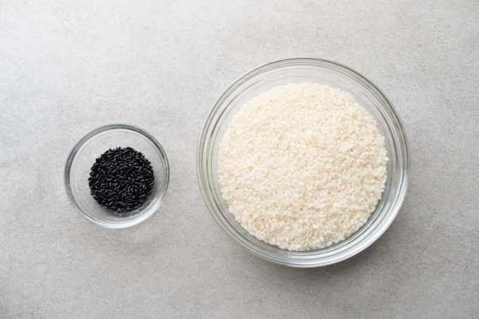 measuring out black and white rice