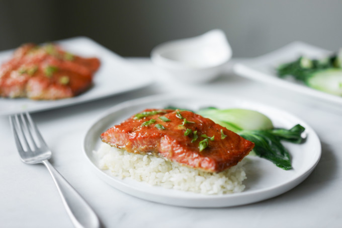 baked miso-glazed salmon on plate with rice and bok choy