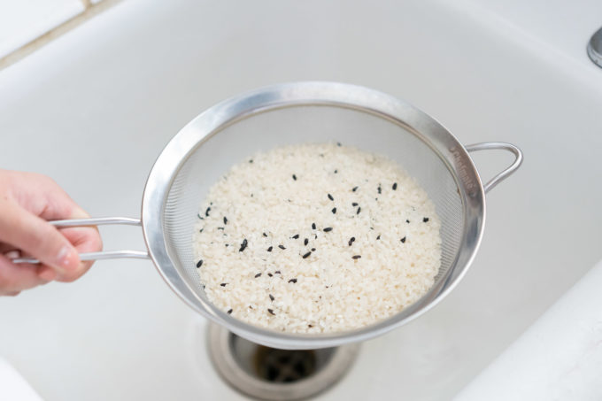 rice in a metal strainer