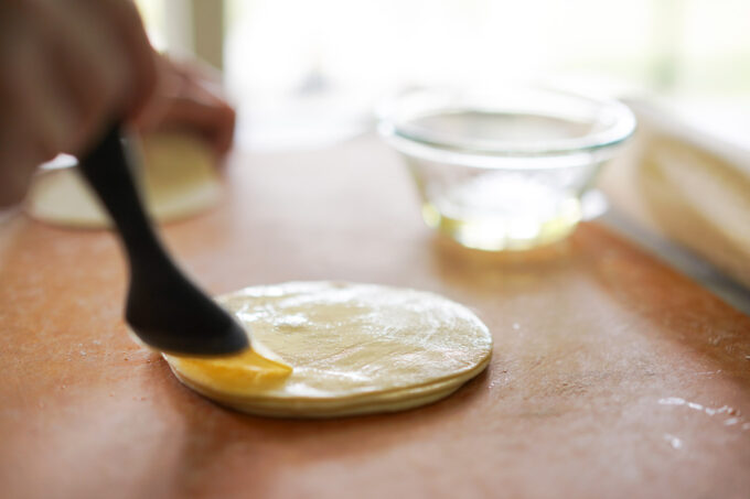 brushing wrappers with oil