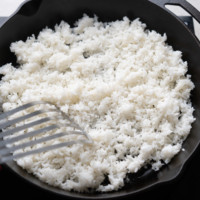 rice reheating in a pan