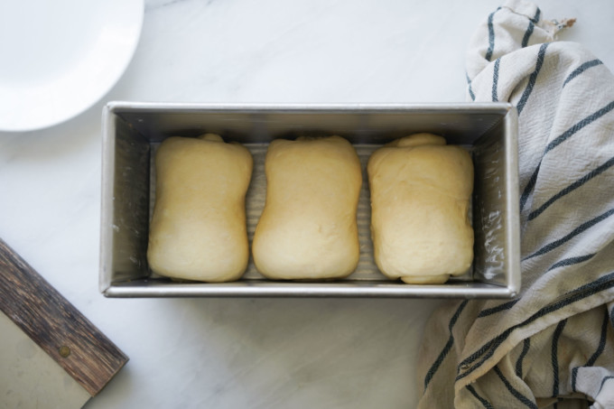 rolled dough in baking pan